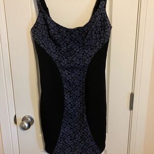 Black Halo, black little dress. Size 4. Pictures show additional descriptions.